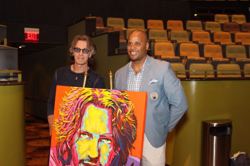 Rick with artist Mike Emory who created the fabulous art piece of Rick seen here